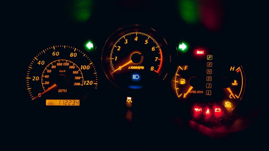 Car instrument cluster showing the dashboard where the check engine light appears